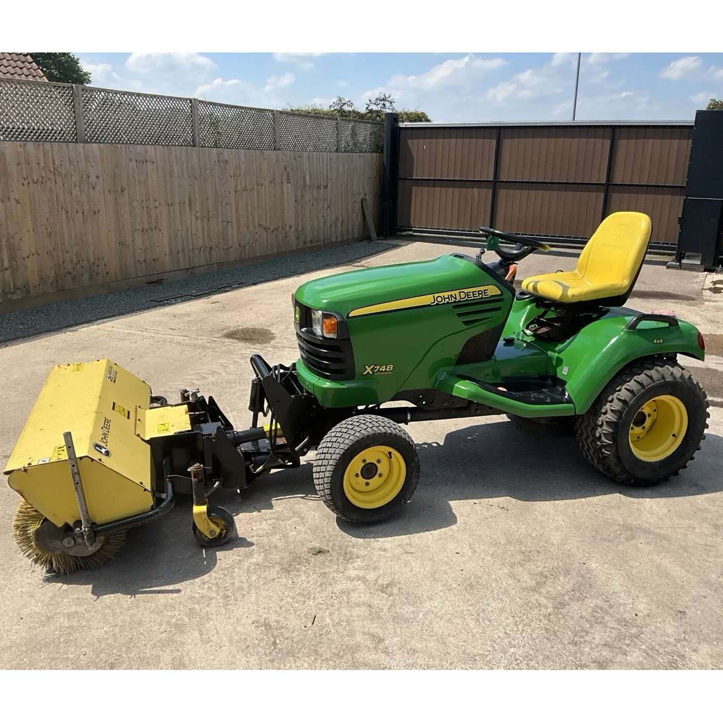 2010 JOHN DEERE X748 4WD DIESEL TRACTOR MOWER WITH 54 INCH POWERED BRUSH